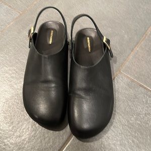 Beatrice Valenzuela black clogs